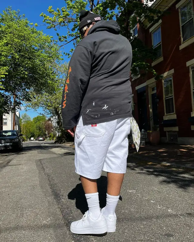Duke Deuce outfit in Balenciaga, Versace, and New Era, 2022