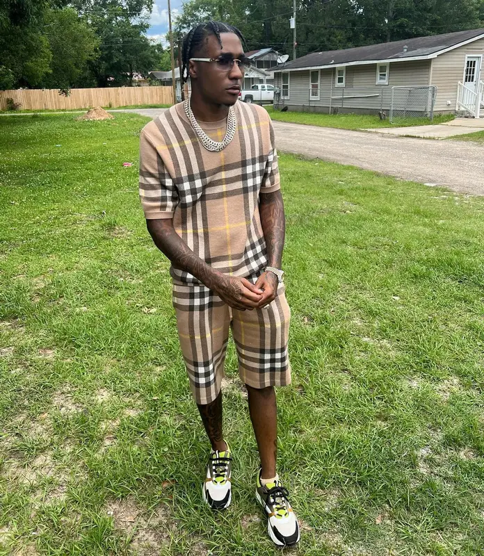 MGM Lett outfit in Burberry, Dior, and Cartier, 2022