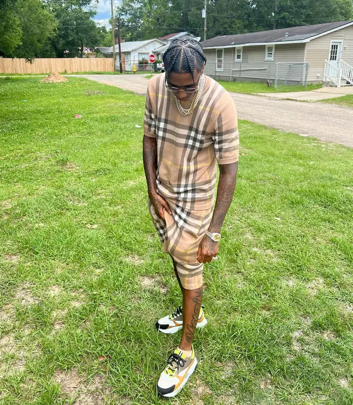 MGM Lett outfit in Burberry, Dior, and Cartier, 2022
