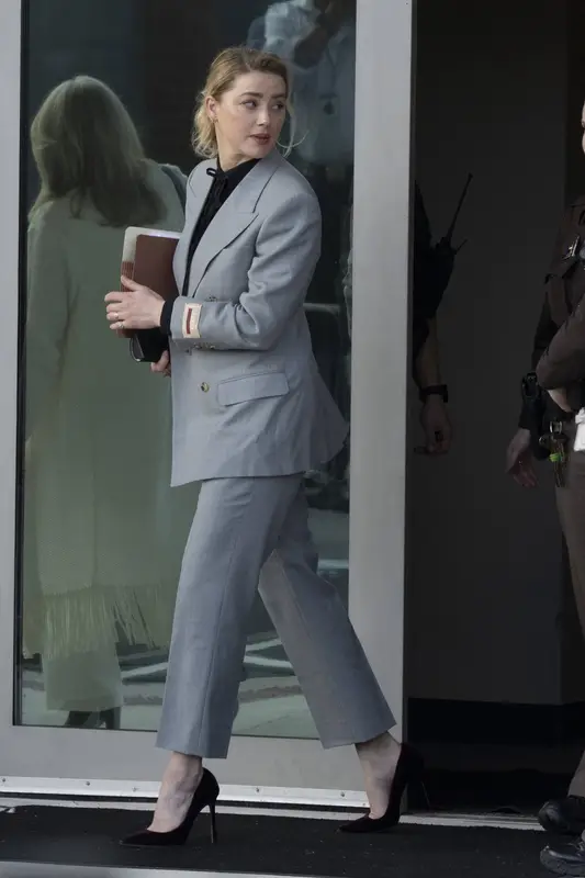 Amber Heard outfit in Gucci, Gianvito Rossi, and Anita Ko, 2022