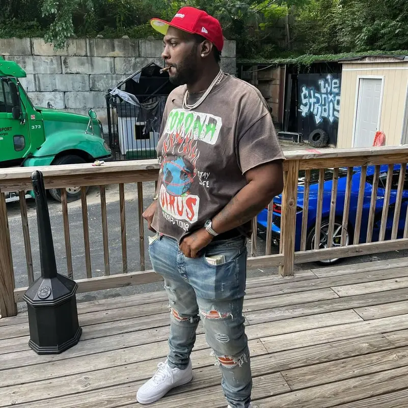Peezy outfit in Gallery Dept., Supreme, and New Era, 2022
