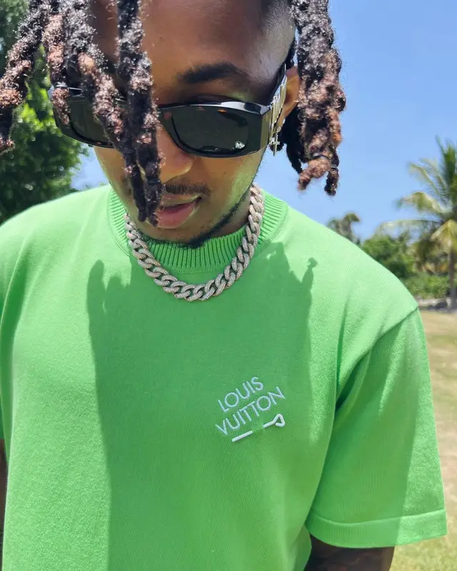 DDG outfit in Louis Vuitton, Amiri, and Palm Angels, 2022