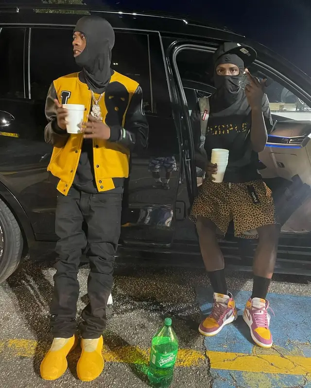 PGF Nuk outfit in Purple Brand, Sprayground, and New Era, 2022