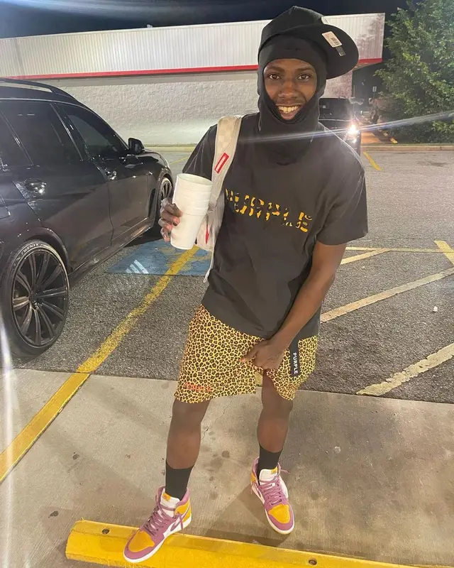 PGF Nuk outfit in Purple Brand, Sprayground, and New Era, 2022