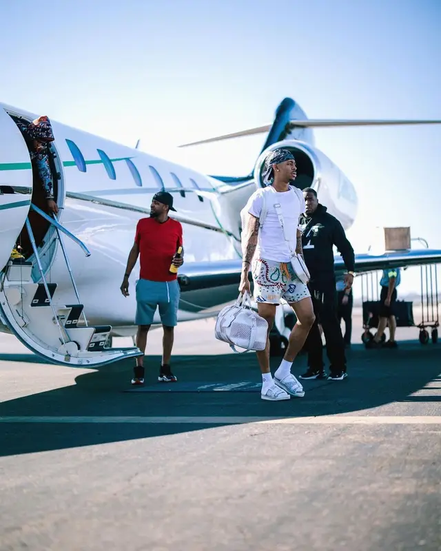 Ja Morant outfit in Rhude, Louis Vuitton, and Dior, 2022