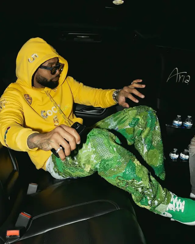 Odell Beckham Jr outfit in Chanel, Louis Vuitton, and Pharrell Williams, 2022