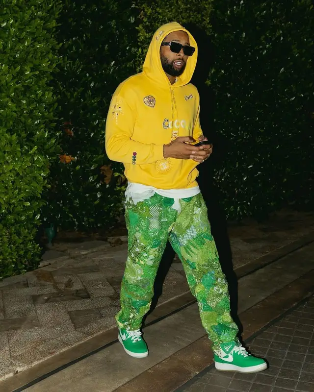 Odell Beckham Jr outfit in Chanel, Louis Vuitton, and Pharrell Williams, 2022