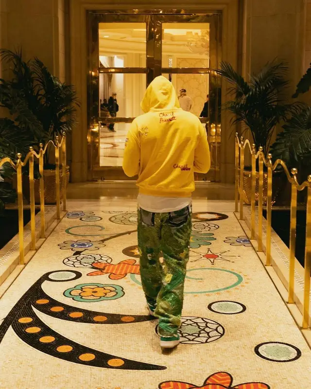 Odell Beckham Jr outfit in Chanel, Louis Vuitton, and Pharrell Williams, 2022
