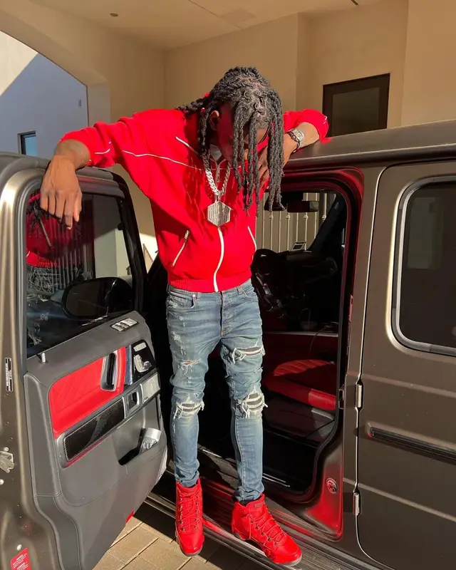Polo G outfit in Celine, Amiri, and Jordan, 2022