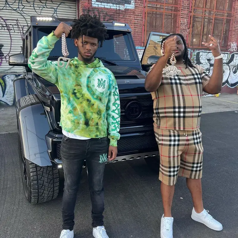 Tee Grizzley outfit in Burberry and Nike, 2022