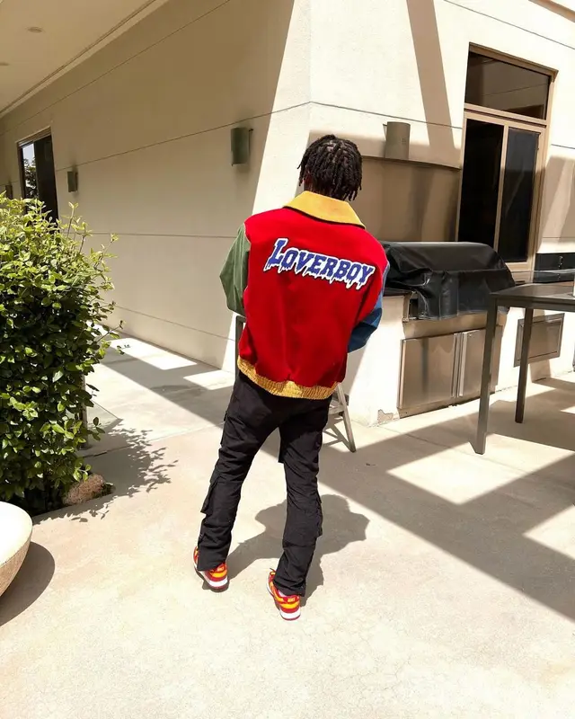 NBA YoungBoy outfit in Loverboy by Charles Jeffrey, Dior, and Nike, 2022
