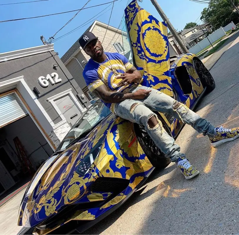 50 Cent outfit in Versace and New Era, 2019