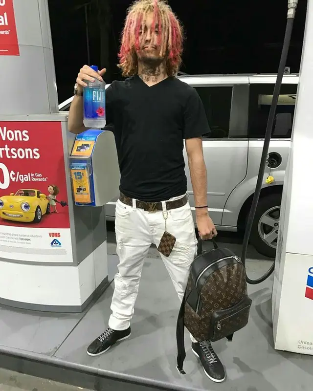 Lil Pump outfit in Balmain, Gucci, and Louis Vuitton, 2017