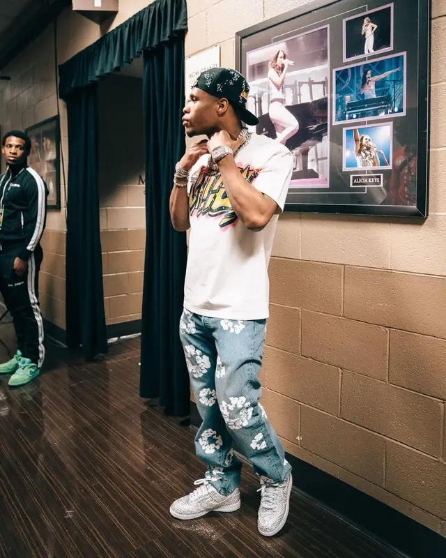 Devin Haney outfit in Levi’s, Louis Vuitton, and Denim Tears, 2022
