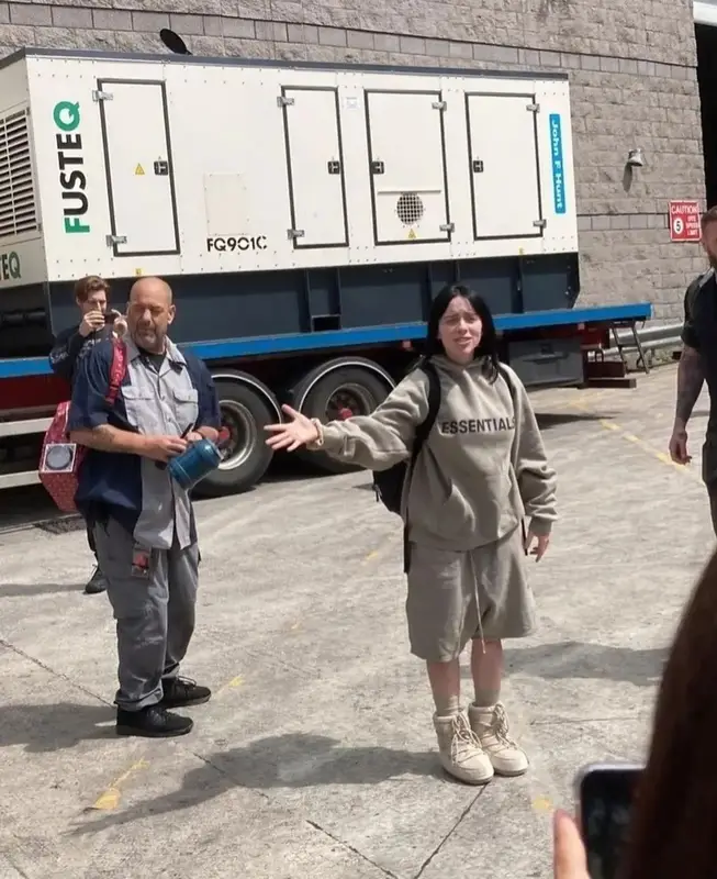 Billie Eilish outfit in Fear of God and Moon Boot, 2022