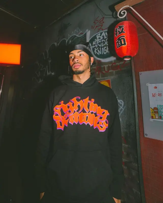 Amari Bailey outfit in Vlone, Prada, and Juice Wrld Merch, 2022