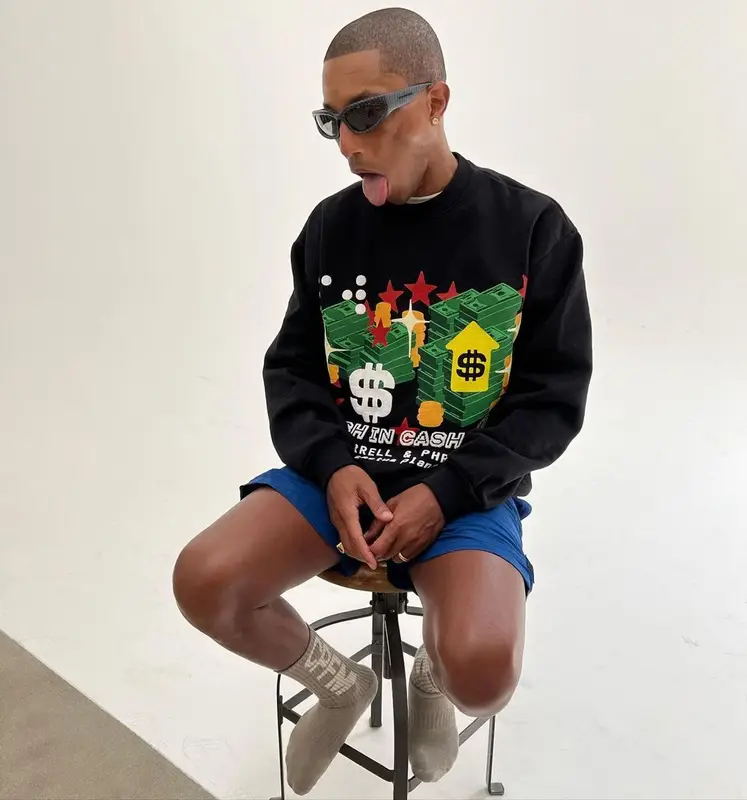 Pharrell Williams outfit in Cactus Plant Flea Market, Balenciaga, and Pharrell Williams Merch, 2022