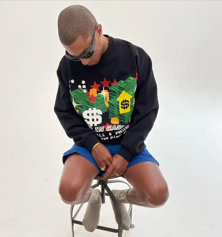 Pharrell Williams outfit in Cactus Plant Flea Market, Balenciaga, and Pharrell Williams Merch, 2022