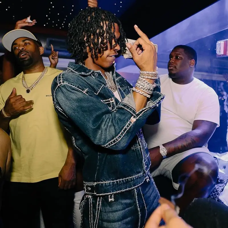 Lil Baby outfit in Supreme, Nike, and True Religion, 2022