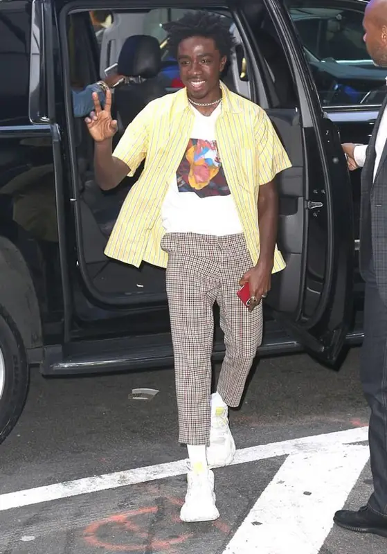 Caleb McLaughlin outfit in Tommy Hilfiger, Coach, and Disney, 2019