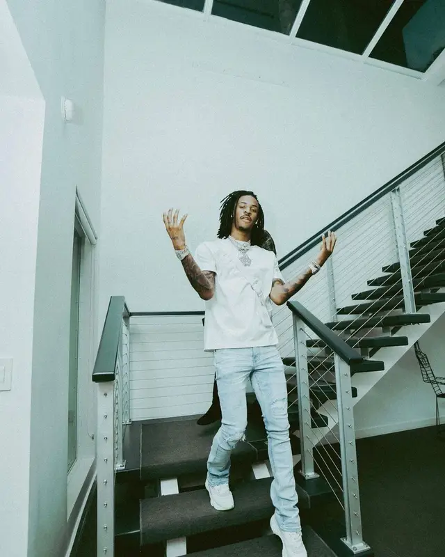Ja Morant outfit in Serenede, Dior, and Louis Vuitton, 2022
