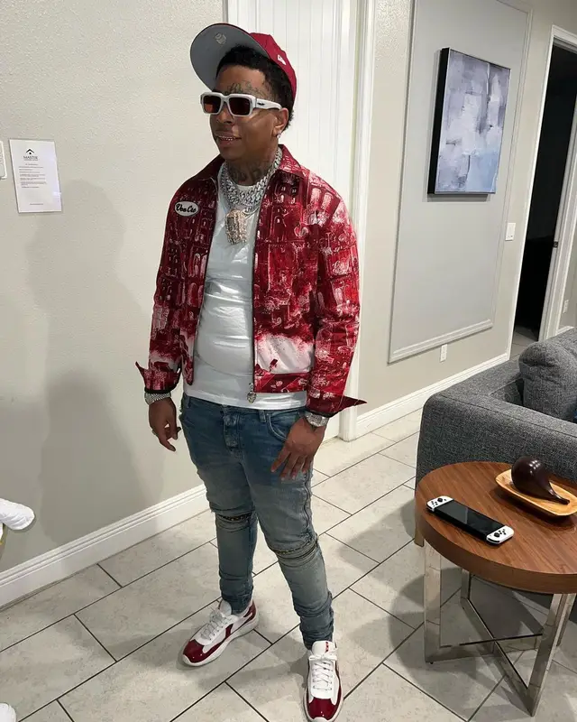 Lil Gotit outfit in Von Cre, Amiri, and Prada, 2022