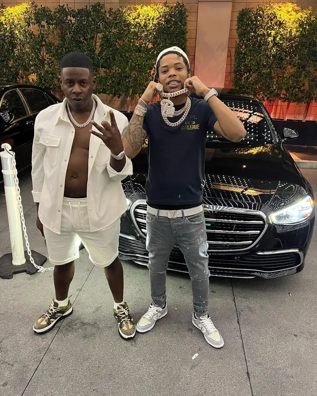 Lil Migo outfit in Gallery Dept., Louis Vuitton, and New Era, 2022