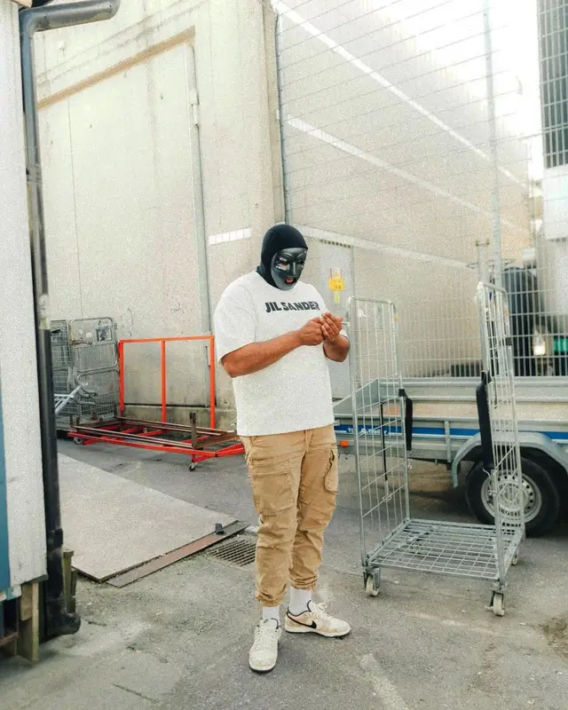 M Huncho outfit in Jil Sander, Kith, and Nike, 2022