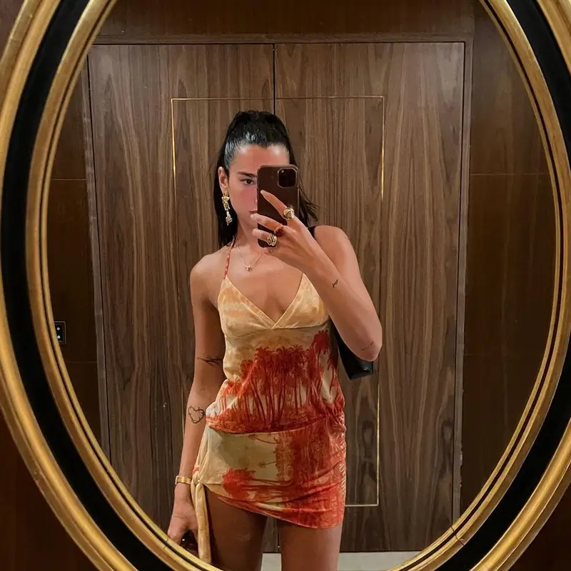 Dua Lipa outfit in Balenciaga, Tom Ford, and Jean Paul Gaultier, 2022