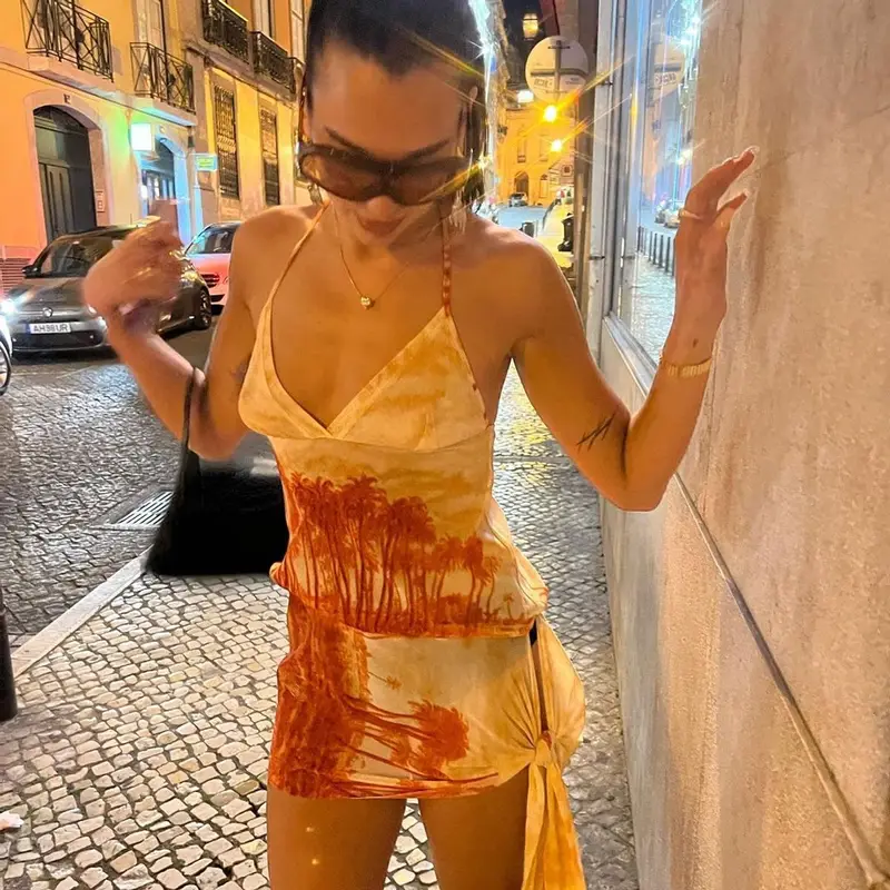Dua Lipa outfit in Balenciaga, Tom Ford, and Jean Paul Gaultier, 2022