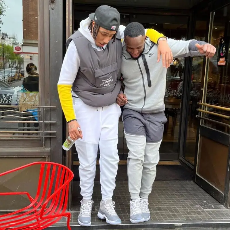 AJ Tracey outfit in Supreme, Nike, and Jordan, 2022