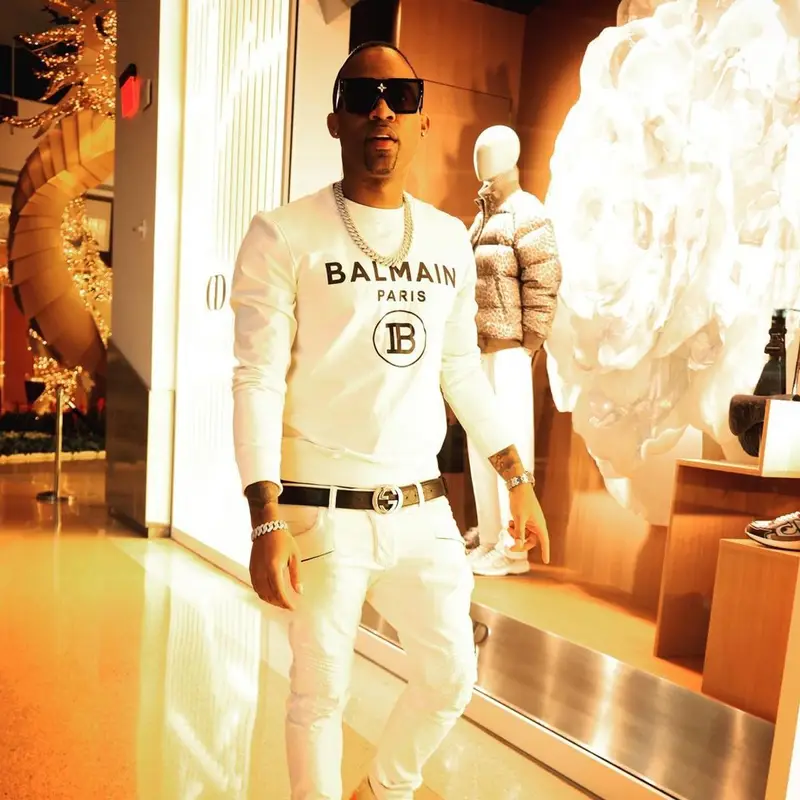 NatStar outfit in Balmain, Gucci, and Louis Vuitton, 2022