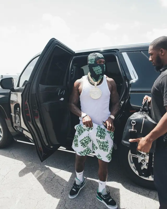 DaBaby outfit in Jordan, Billion Dollar Baby, and Nike, 2022