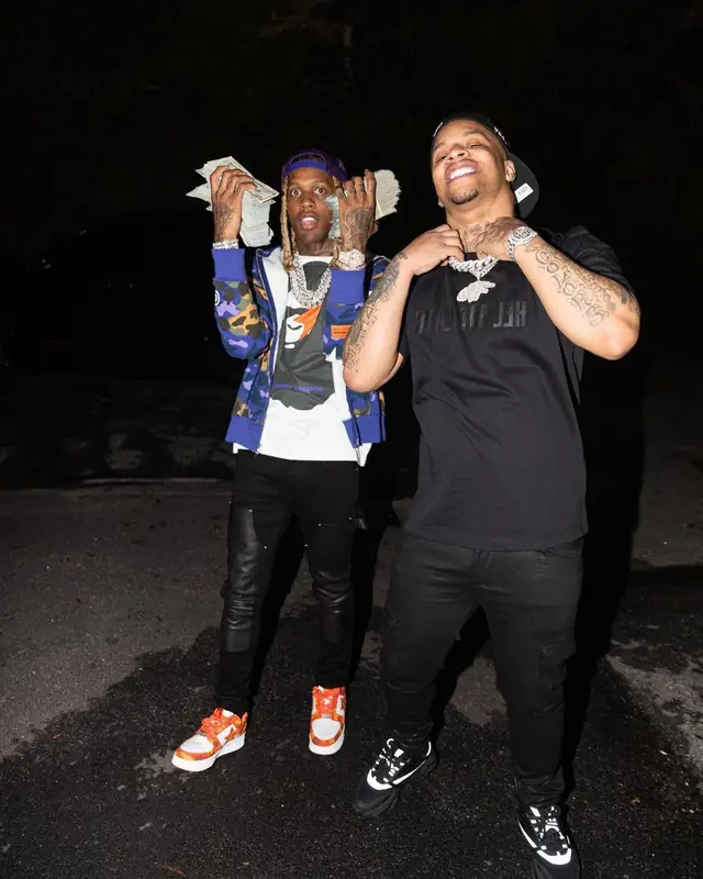 Lil Durk outfit in Amiri, Bape, and Heron Preston, 2022