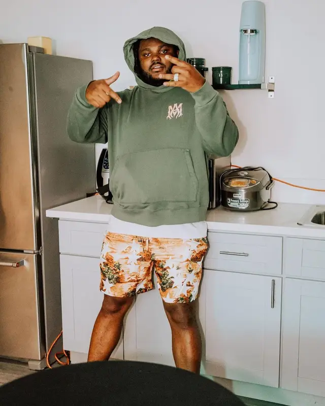 Tee Grizzley outfit in Amiri and Nike, 2022