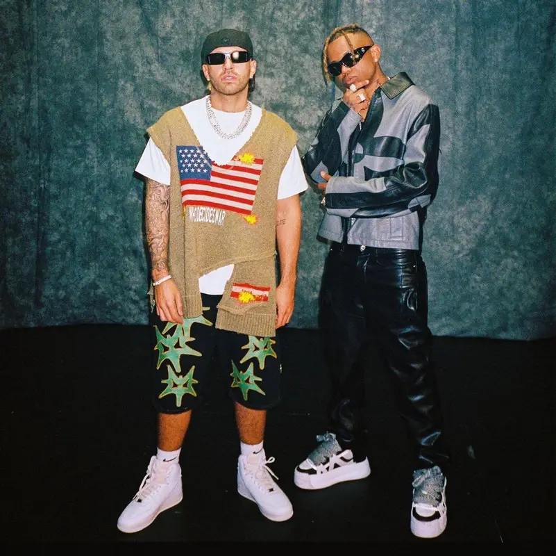 Feid outfit in Who Decides War, Oakley, and Nike, 2022