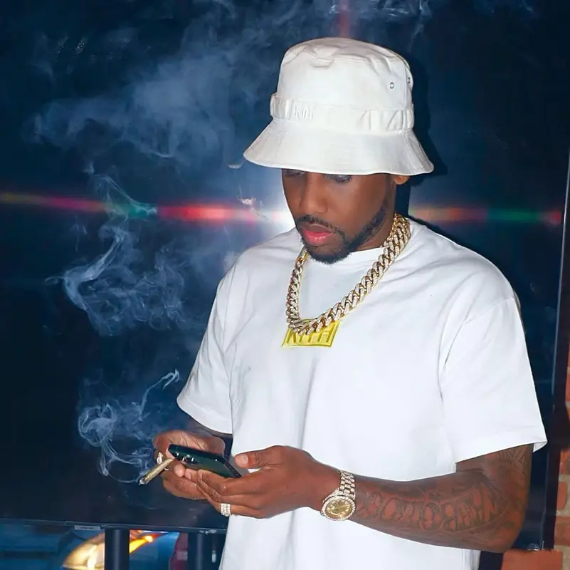Fabolous outfit in Supreme, Kith, and Louis Vuitton, 2022