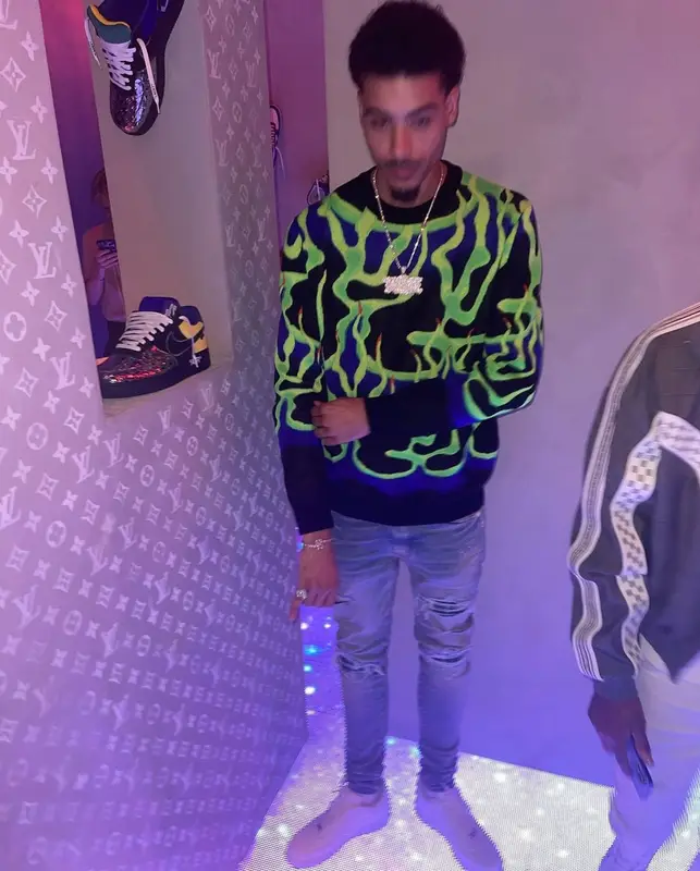 Jay Critch outfit in Louis Vuitton, Amiri, and Nike, 2022