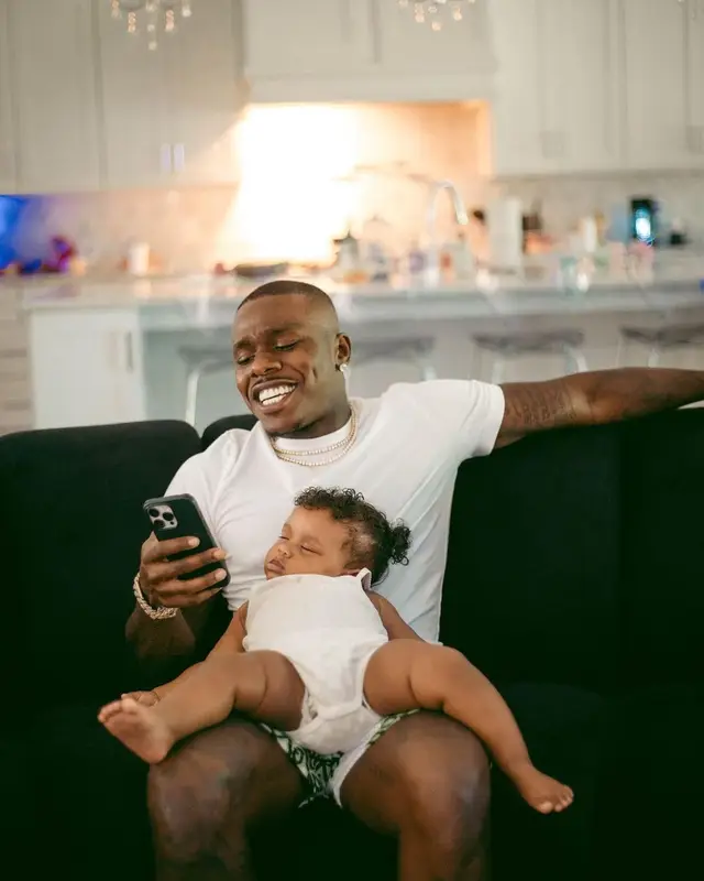 DaBaby outfit in Polo Ralph Lauren, Billion Dollar Baby, and Louis Vuitton, 2022