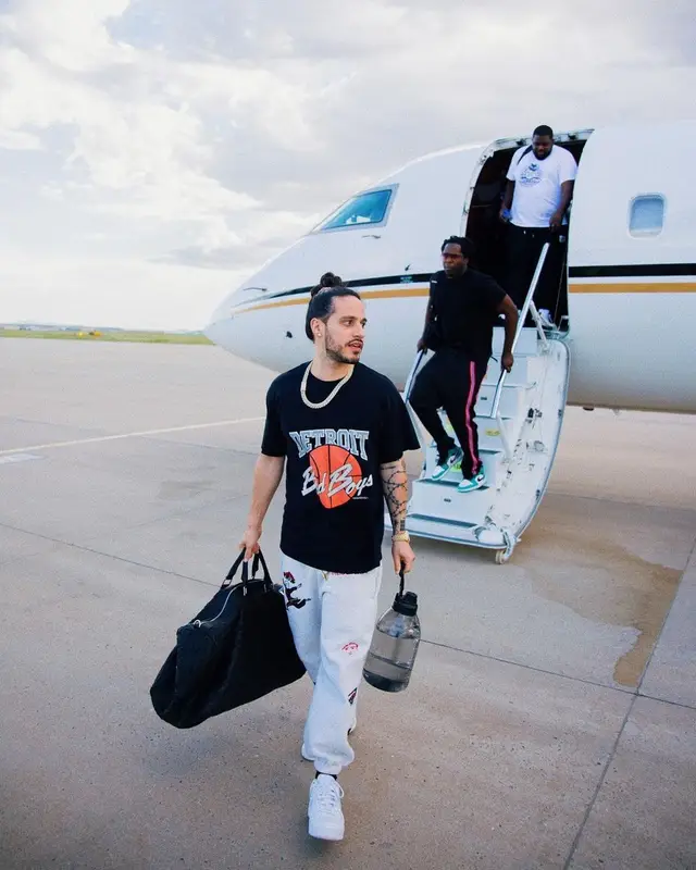 Russ outfit in KidSuper, Nike, and Bottega Veneta, 2022