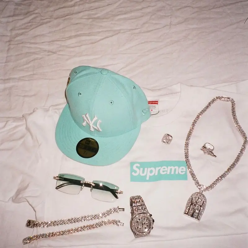 OhGeesy outfit in Supreme, New Era, and Tiffany&Co, 2022