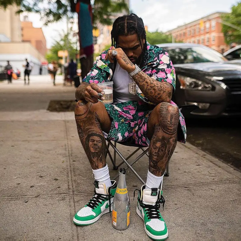 Dave East outfit in Nike, Supreme, and The North Face, 2022