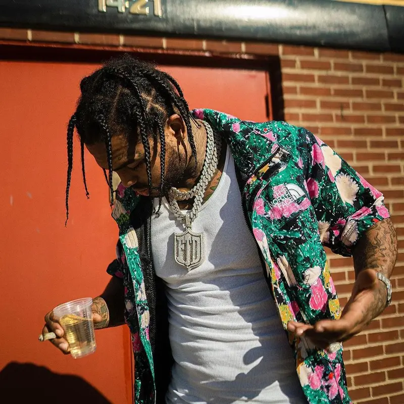 Dave East outfit in Nike, Supreme, and The North Face, 2022