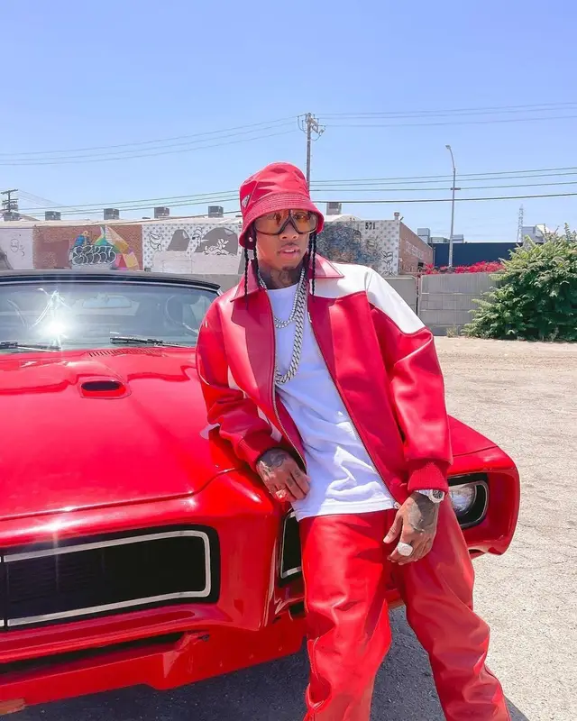 Tyga outfit in Nike, Tom Ford, and Prada, 2022