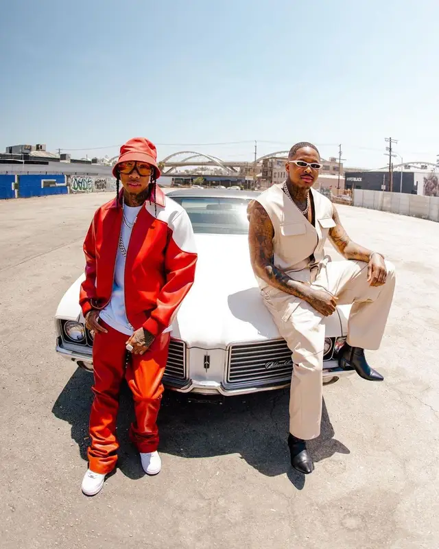 Tyga outfit in Nike, Tom Ford, and Prada, 2022