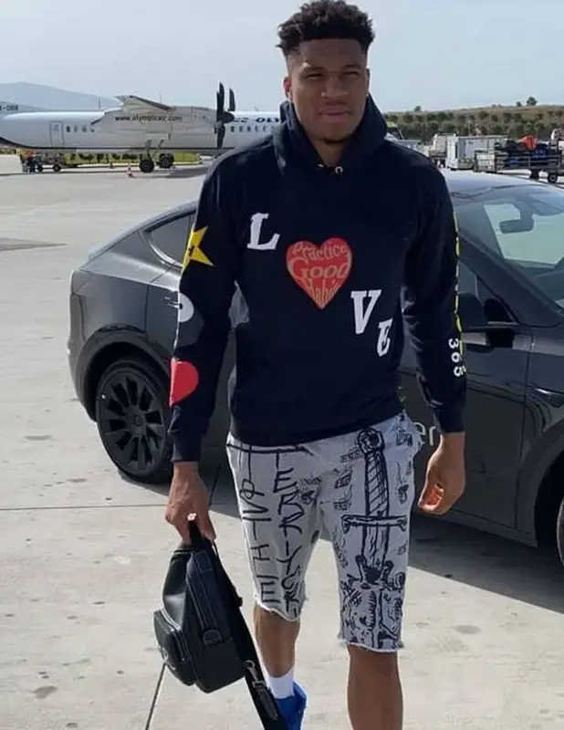 Giannis Antetokounmpo outfit in Habits 365, Dior, and Nike, 2022