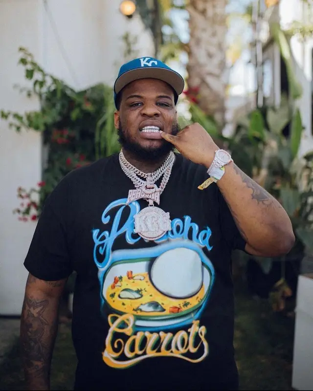 Maxo Kream outfit in Amiri, Jordan, and Louis Vuitton, 2022