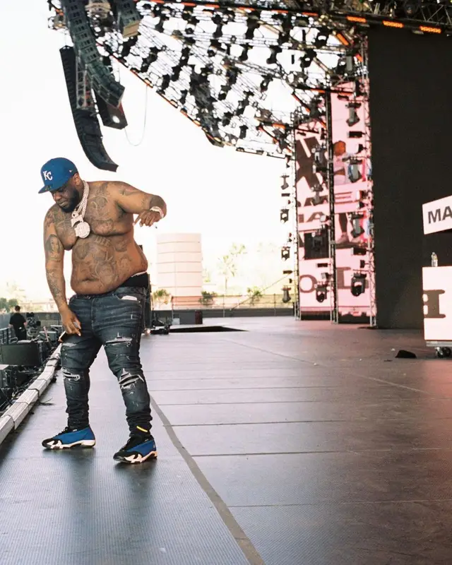 Maxo Kream outfit in Amiri, Jordan, and Louis Vuitton, 2022