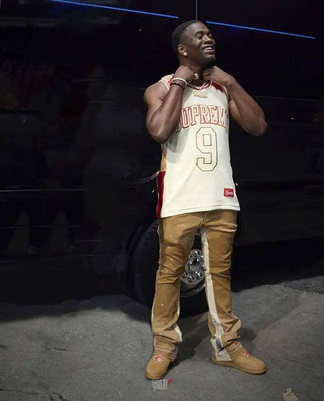 Bankroll Freddie outfit in Supreme, Valabasas, and Nike, 2022