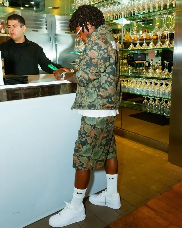 Jacquees outfit in Etro and Nike, 2022